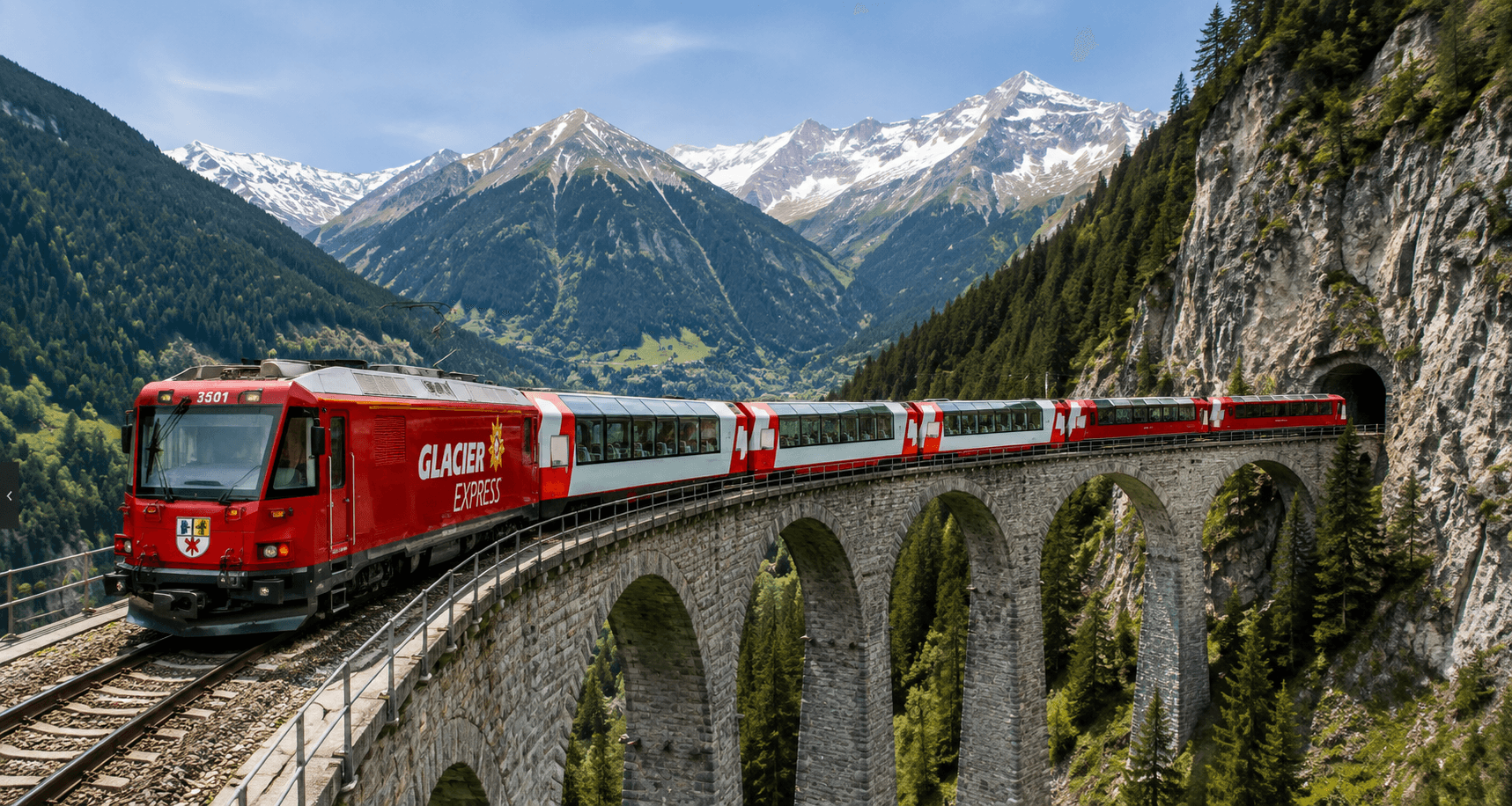 Glacier Express scenic train crossing a stone viaduct in the Swiss Alps